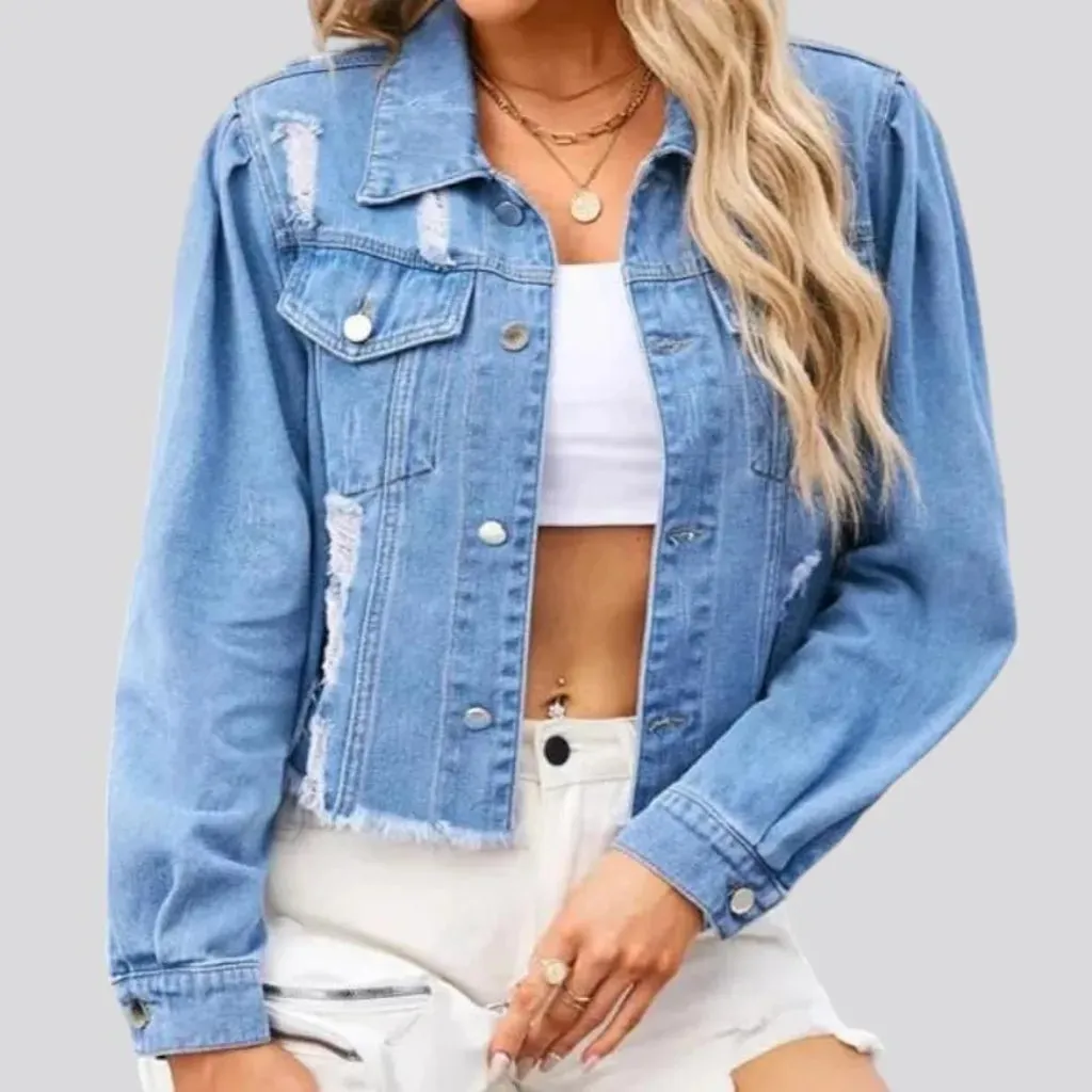 Light-wash distressed denim jacket