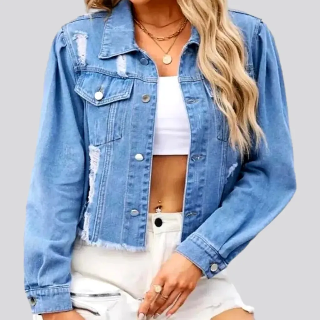 Light-wash distressed denim jacket